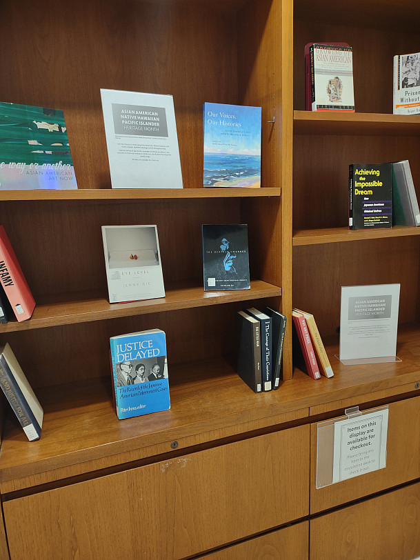 AANPI Heritage Month display bookshelf in the Reference Commons.