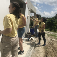 student performing service in Puerto Rico