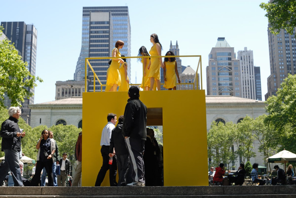 Kate Gilmore, Walk the Walk, 2010 (Performance/Installation, Public Art Fund, New York, New York; Women dressed in yellow walking atop a painted yellow structure)