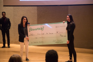 Seniors Angela Galli and Kelly Hayes receive oversized check for winning the second annual Start Up Purchase Pitching Competition