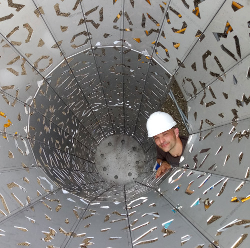 Director, School of Art+Design Christopher Robbins inside the sculpture on site at the American R...