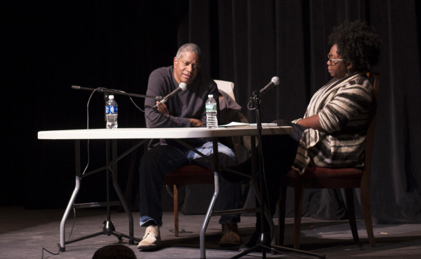 Paul Beatty on stage with Mariel Rodney, assistant prof of literature