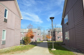 Exterior pathway and buildings of Alumni Village.