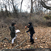 Luz Medina and Jessica Lau measure plants in forest fragments
