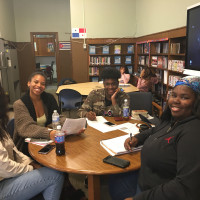 A photo of the Mt. Vernon student tutors smiling with students.