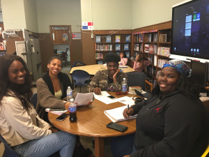 A photo of the Mt. Vernon student tutors smiling with students.