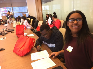 Students working on an assignment at the desk.