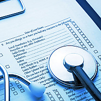 Stethoscope on medical chart