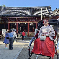 A student riding rickshaw in Japan
