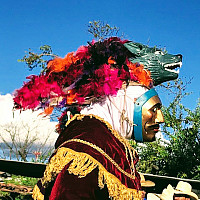 Performer with mask and wolf