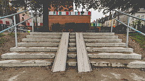 Set of stairs with wheel chair ramp