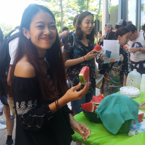 International student orientation watermelon eating