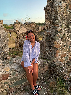 Student sitting on rocks