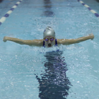 Swimmer in the pool in Physical Education building