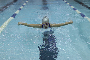Swimmer in the pool in Physical Education building