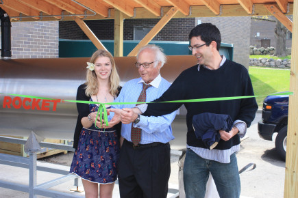 Anna Palmer '15, President Schwarz, and Professor Matthew Immergut at the ribbon-cutting for The Rocket composter