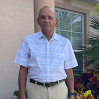 Photo of Renneth Sorhaindo standing outside his home