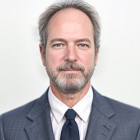 Ken McGinis '95 (Economics)