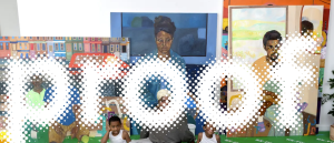 A group of people sit on a green floor in front of colorful portrait paintings. The word PROOF in bold, don fl