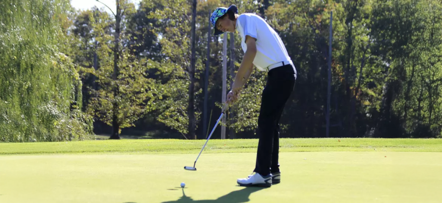 Christian competing on the Purchase golf team.