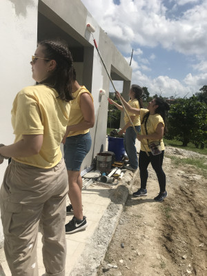 student performing service in Puerto Rico