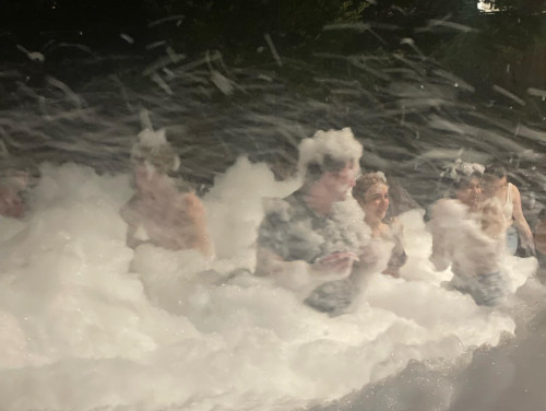 Frolicking in the foam at the Welcome Foam Party 2022.