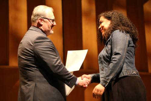 Senior Awards Ceremony 2017: Barry Pearson shakes recipient's hand.