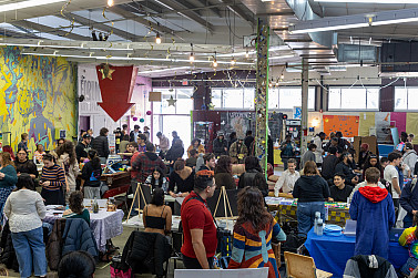 A crowd of people inside the Student Center.