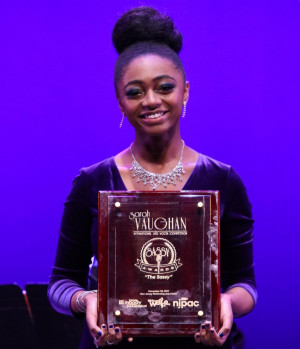 Samara Joy McLendon '21 holds her Sarah Vaughan Jazz Vocal award.