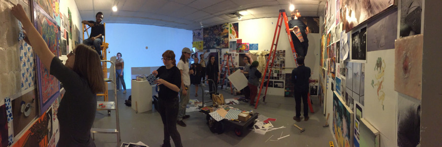 A group of Peer Advisors setting up for their annual exhibition.