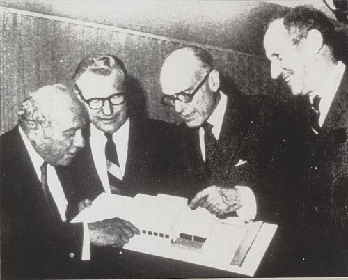 August Heckscher, then New York City Parks Commissioner, examining the model at the opening of the exhibition.