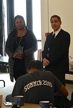 Director, Paul Nicholson (right) awarding Keisha Martin, , with the Friend of EOP/MAP Award