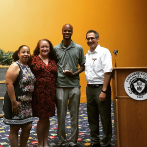 Donnell Charles, second from right, pictured with EOP director, Paul Nicholson (R), EOP Counselors, Mary Garcia, and Glory Rojas (L)