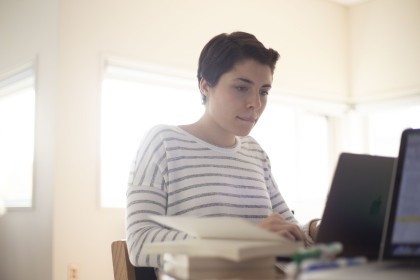 Student at computer in creative writing class