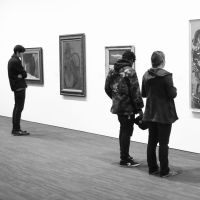 Archival image: Purchase College students engaging with artworks from the collection in the Neuberger galleries.
