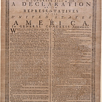 Image of the Holt Broadside. A weathered document with very small type in two columns.