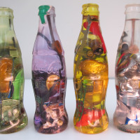 Luis Perelman Coca Cola Series, 1998 21 parts; found materials embedded in clear resin 7 ½ x 2 ¼ x 2 ¼ Courtesy of Luis Perelman