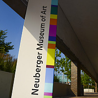Neuberger Museum of Art signage on the mall outside the building
