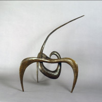 Alexander Calder, Snake on Arch, 1944. Cast bronze, Collection Friends of the Neuberger Museum of Art, Purchase College, State University...