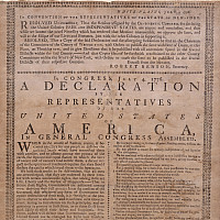 Image of the Holt Broadside. A weathered document with very small type in two columns.