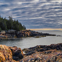A breathtaking view of the rocky Maine coastline in Acadia National Park, Maine.