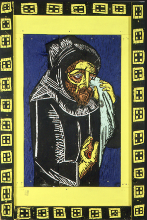 Carved and painted wood panel with a yellow and black border and a central image of Catholic iconography with a weeping male in a black robe