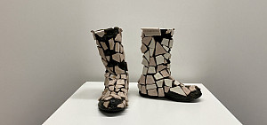 Bisque-fired ceramic plate, silicone on rubber Wellington boots.