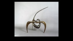 Alexander Calder, Snake on Arch, 1944. Cast bronze, Collection Friends of the Neuberger Museum of Art, Purchase College, State University...