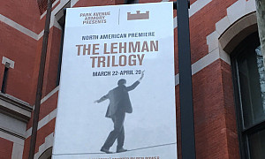A banner for The Lehman Trilogy hanging outside the Park Avenue Armory in New York City