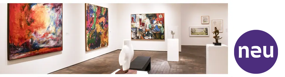 Who NEU 50thAnniversary Exhibitions An image of a gallery with white walls, sculptures in the foreground and colorful abstract art on the walls
