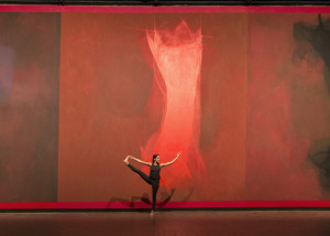 Jessica Pozzuoli performs yoga pose in Neuberger Museum of Art Theatre Gallery with Threnody by Cleve Gray