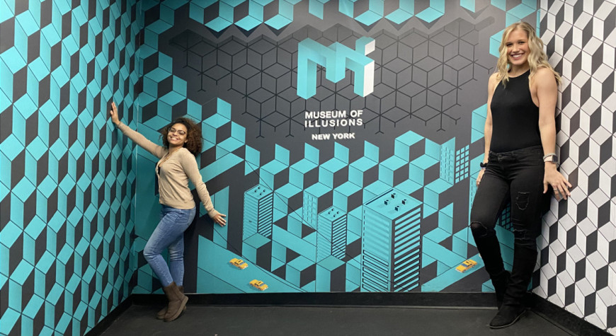 Students at an exhibit at Museum of Illusions