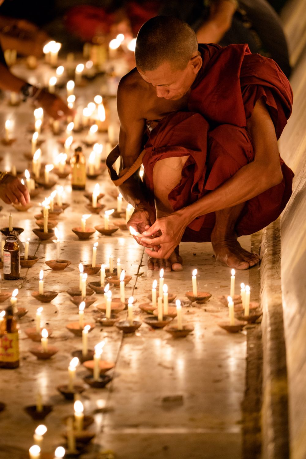 Monk lighting candles (Erin Sullivan '12)