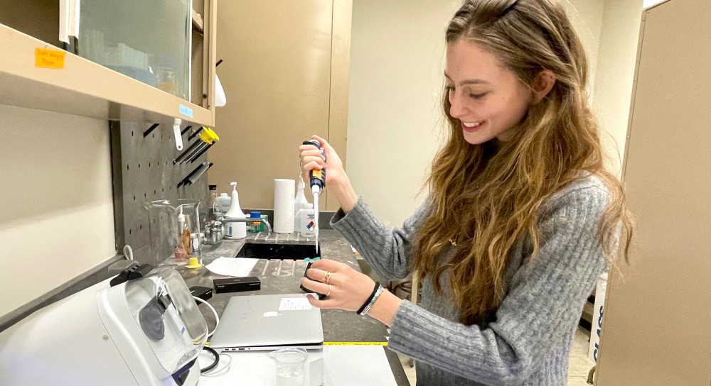 Mackenzie Sky prepares samples for genetic sequencing.